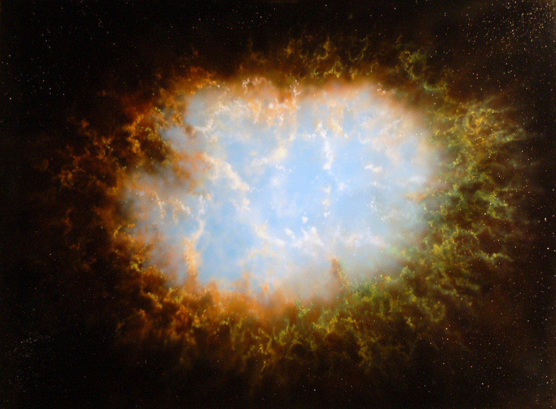 Nebula with a bright central region surrounded by colorful gas and dust